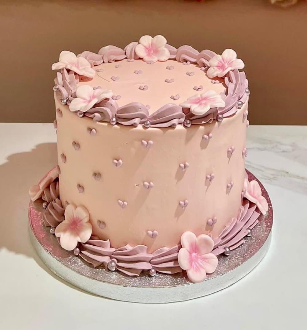 Gâteau floral élégant rose